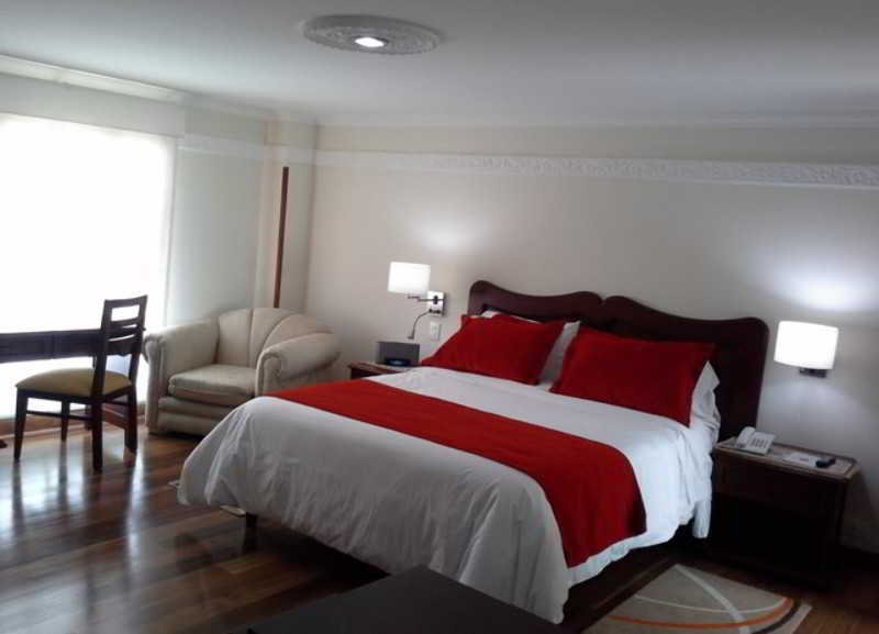 Hotel Santa Lucia Boutique Spa Bogota Bagian luar foto A bedroom in a hotel